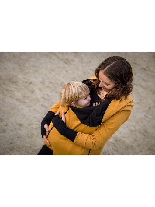 La jaquette de portage Greyse sans inserts! Un hoodie 5 en 1 pour la grossesse, le portage et sans bébé. Livraison en Suisse