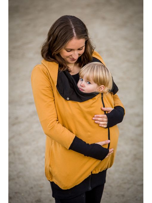 La jaquette de portage Greyse sans inserts! Un hoodie 5 en 1 pour la grossesse, le portage et sans bébé. Livraison en Suisse