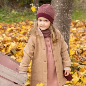 Bonnet en laine mérinos GOTS pour bébé et enfant. Un choix d'habits et d'accessoires pour tenir chaud en hiver. Bonnet, pull, combinaison trouvez votre produits en laine sur jeteporte, achat en suisse