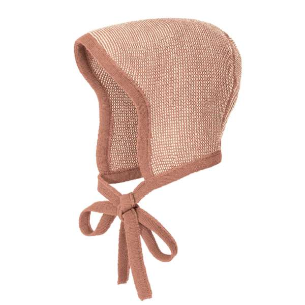 La laine mérinos GOTS pour bébé et enfant. Un choix d'habits et d'accessoires pour tenir chaud en hiver. Bonnet, couverture, gants, pull, combinaison trouvez votre produits en laine sur jeteporte, achat en suisse