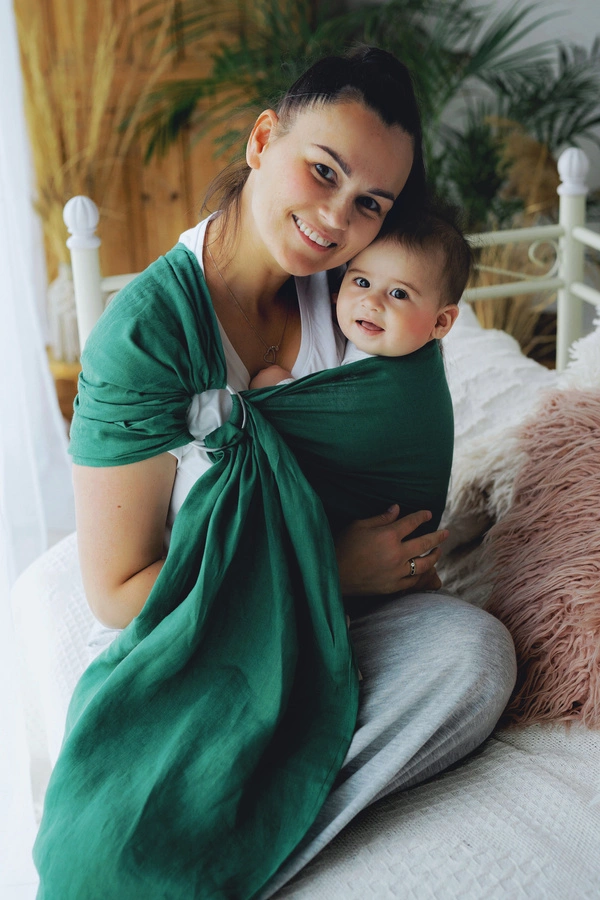 Le sling de portage little frog pour porter votre nouveau né dès la naissance. Physiologique, posture de bebe respectée. Achat en Suisse