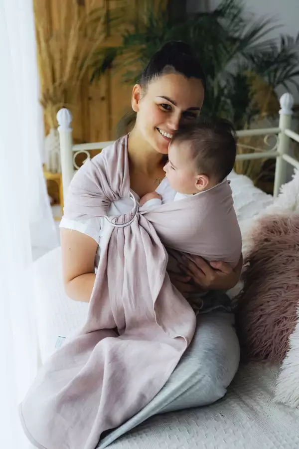 Le sling de portage little frog pour porter votre nouveau né dès la naissance. Physiologique, posture de bebe respectée. Achat en Suisse
