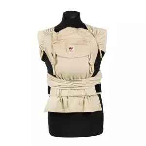Porter son bébé dès la naissance avec le wrapmysol de Girasol. Un porte bébé physiologique et évolutif.